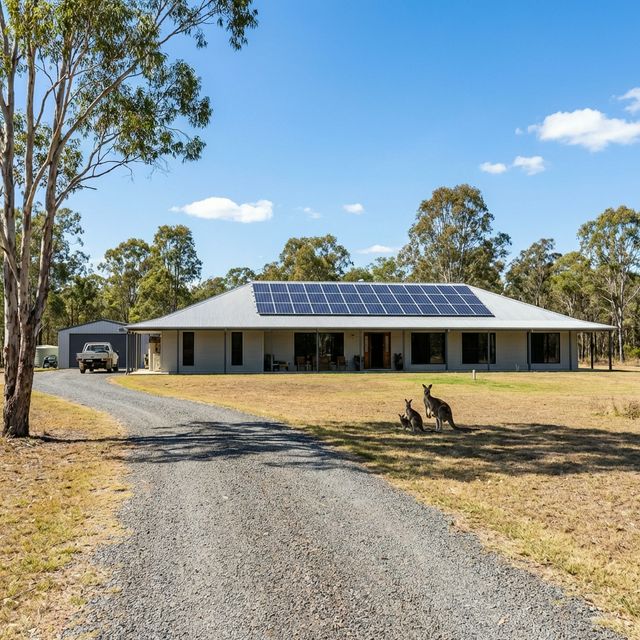 A high quality realistic residential home in Chandler Queensland with a brand new solar panel array on the roof
